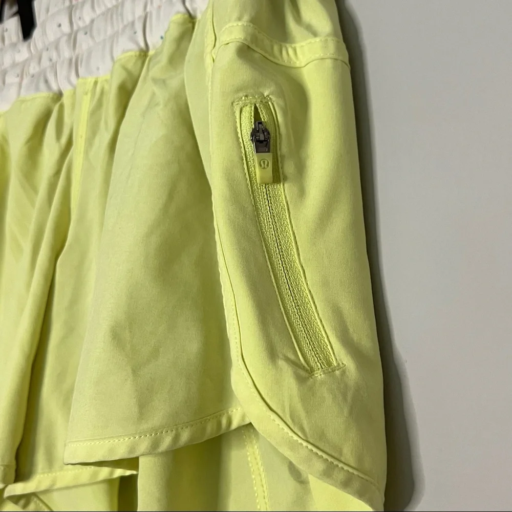 Lululemon Tracker Yellow Shorts with Multicolored Dot patterned waistband